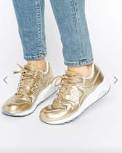 new balance 580 gold trainers from iconic breafsonic