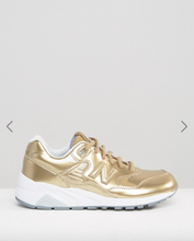 new balance 580 gold trainers from iconic breafsonic